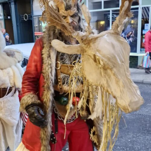 19b29f4f-9951-416d-8b8a-c7f94fbbb4ad A person wearing traditional Krampus outfit for the Krampus Run
