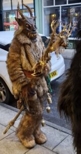 A person dressed in a fur and horned outfit for the Krampus Run