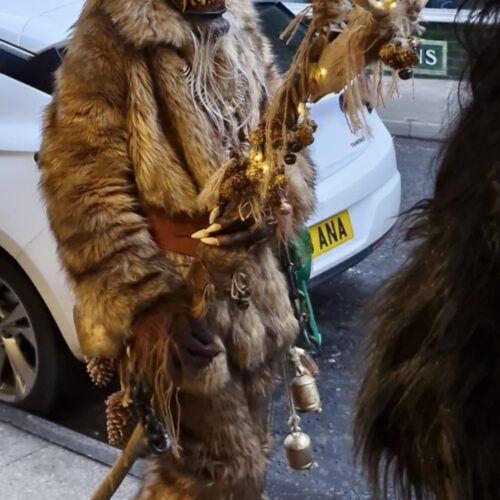 2a218889-aa8e-4a0f-9592-0a085622ff17 A person dressed in a fur and horned outfit for the Krampus Run